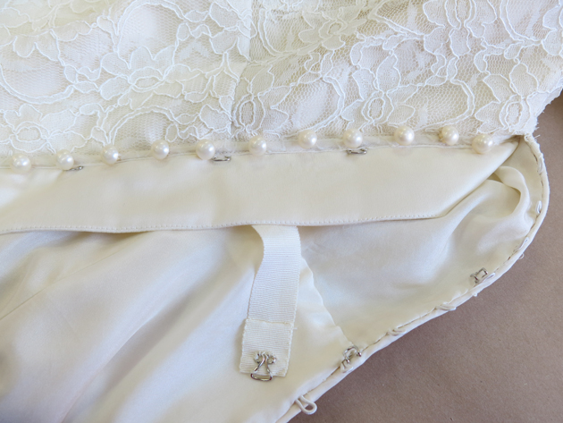 Adding buttons outlet to wedding dress