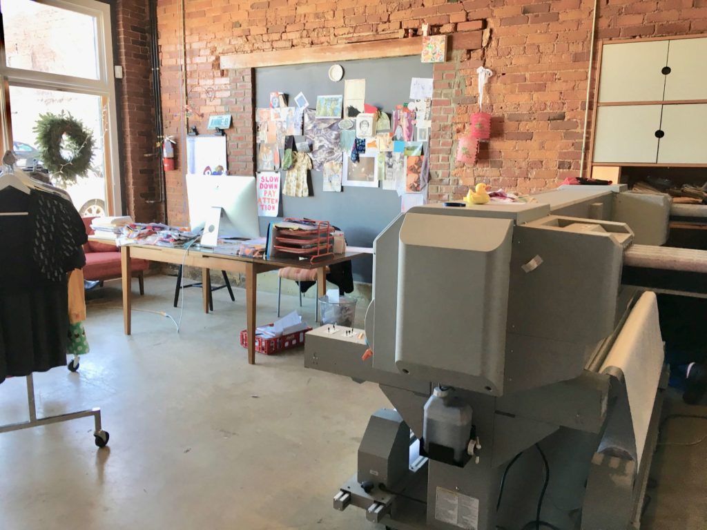 Anne's desk and one of the fabric printers at Red Canary | Brooks Ann Camper Bridal Couture