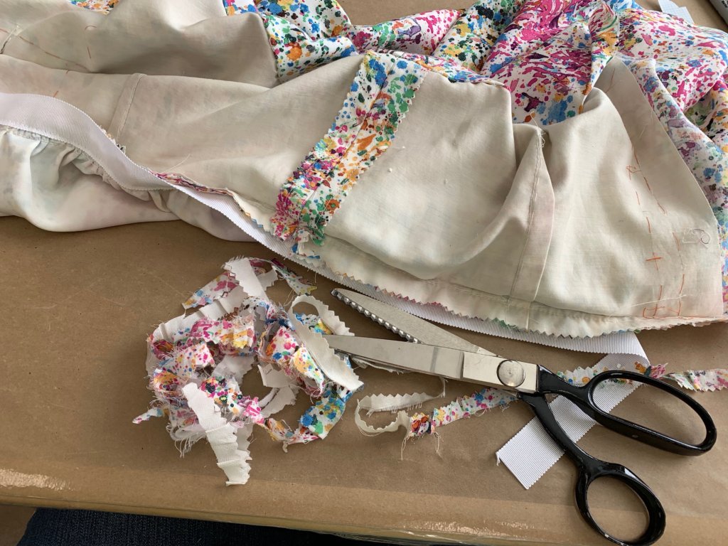 Trimming the waist seam allowance with pinking shears